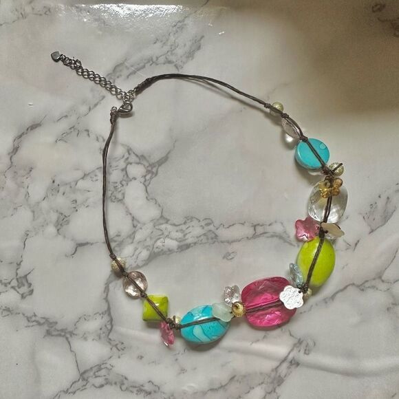 Colorful beaded necklace on brown cord - Picture 3 of 7
